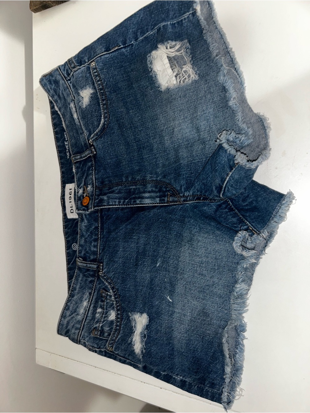 DL1961 Distressed Cropped Denim Shorts in Blue